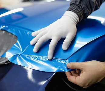 Custom car wrapping with a vibrant design for a stylish and protected finish